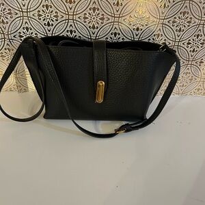 Chic Black Crossbody Bag . New without tags.
